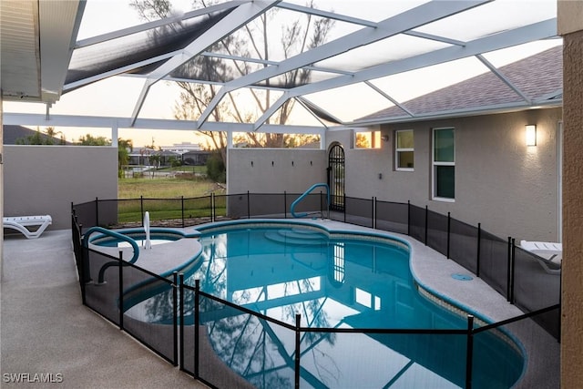 2902 SW 10th Pl, Cape Coral, FL 33914 - view of pool featuring a pool with connected hot tub, a patio area, and glass enclosure