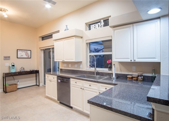 2902 SW 10th Pl, Cape Coral, FL 33914 - kitchen with dishwasher, a sink, white cabinets, and dark countertops