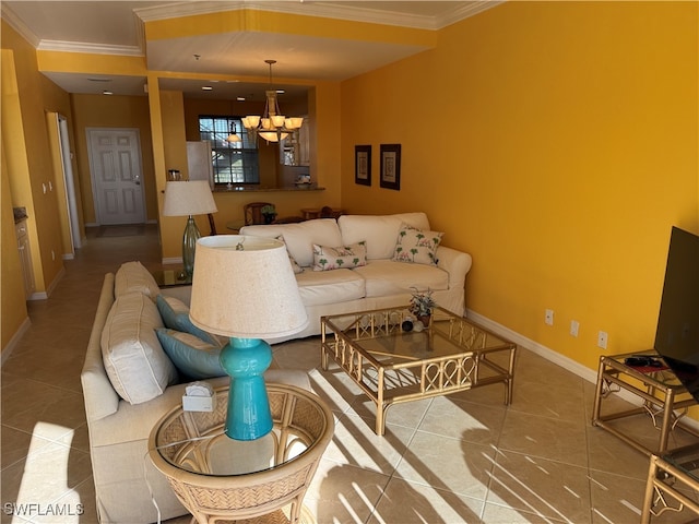 living room featuring tile patterned flooring, an inviting chandelier, and ornamental molding