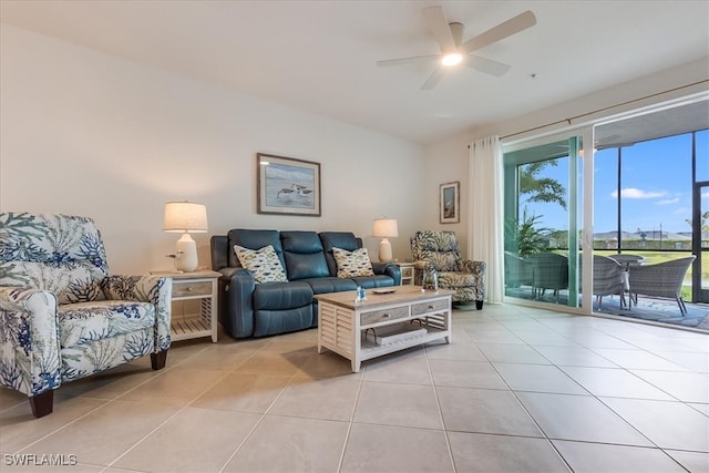 living room featuring ceiling fan and light tile patterned flooring