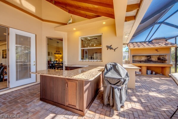 view of patio with an outdoor bar