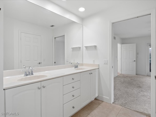 bathroom featuring tile patterned floors and vanity