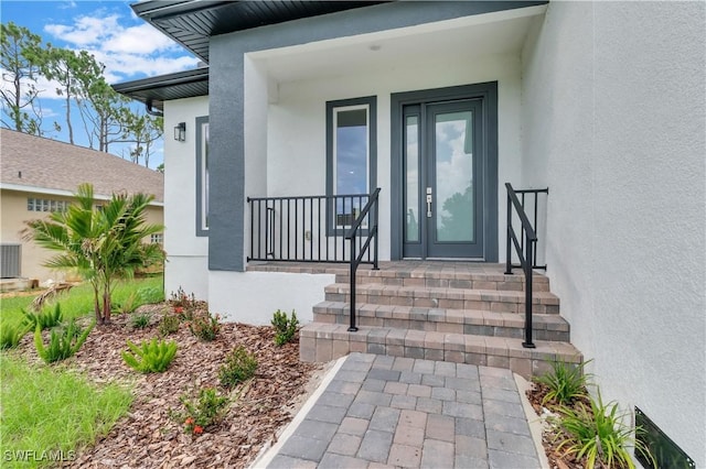 doorway to property featuring covered porch