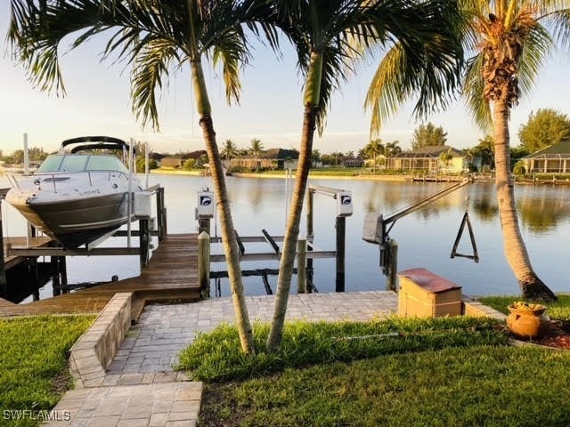 view of dock with a water view