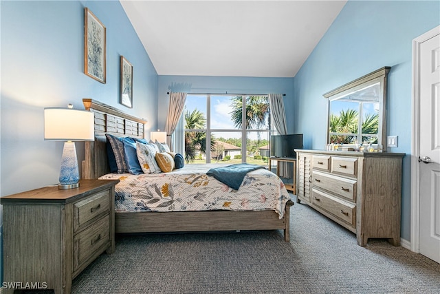 carpeted bedroom featuring vaulted ceiling