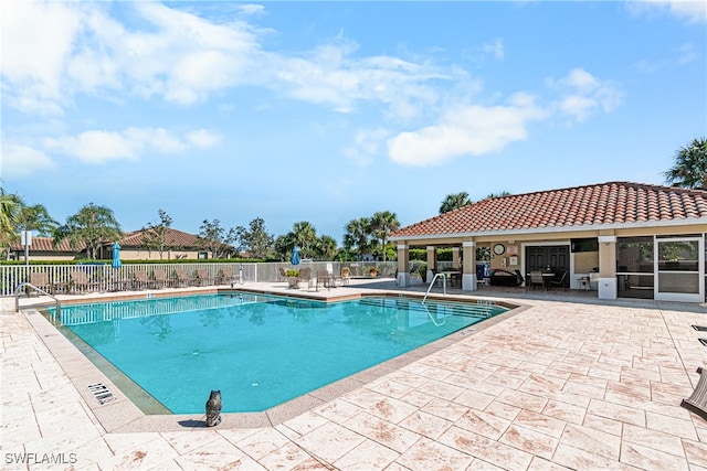 view of pool featuring a patio