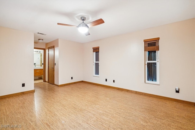 empty room featuring ceiling fan