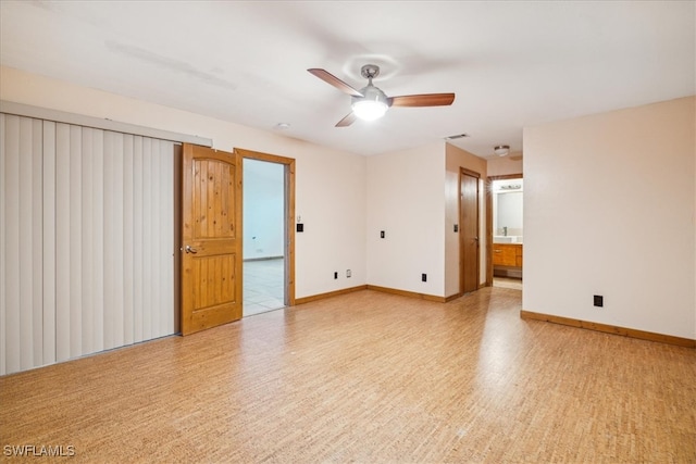 empty room featuring ceiling fan