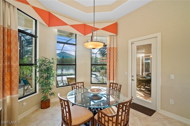 tiled dining area with a healthy amount of sunlight