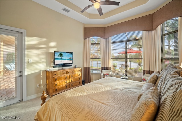 bedroom featuring carpet, access to outside, and ceiling fan