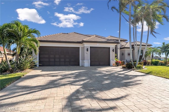 view of front of home with a garage