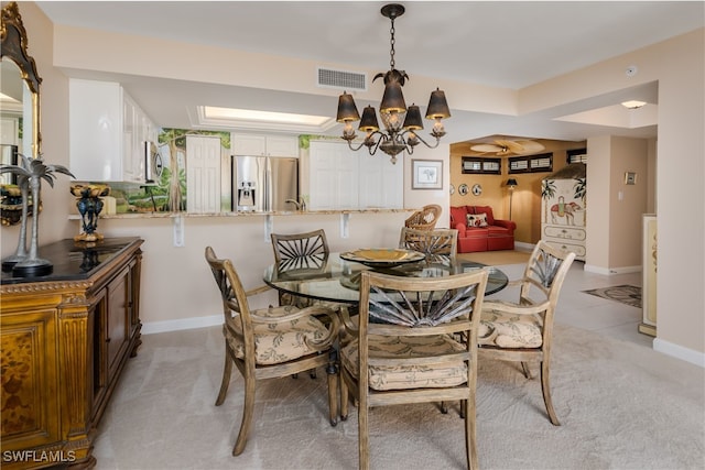 dining room with an inviting chandelier