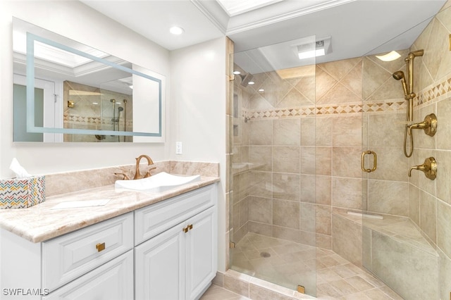 bathroom with tile patterned floors, vanity, and a shower with shower door