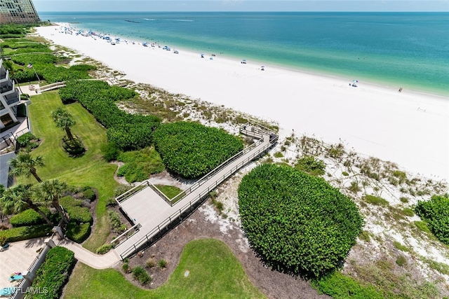 bird's eye view with a view of the beach and a water view