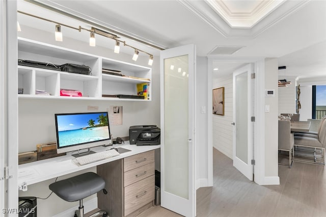 office space featuring light hardwood / wood-style floors and ornamental molding