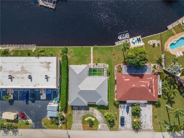 bird's eye view with a water view