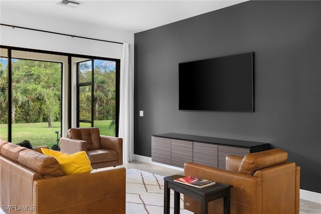 living room featuring light tile patterned floors