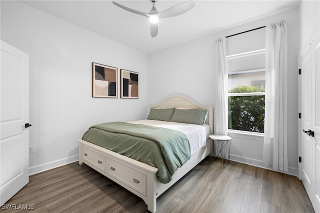 bedroom featuring ceiling fan and wood-type flooring