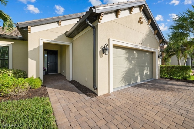 exterior space with a garage