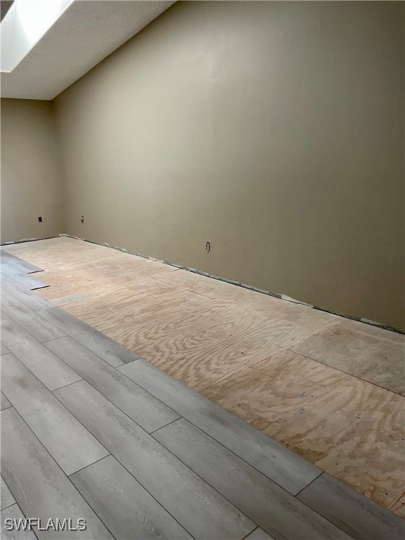 spare room featuring light wood-type flooring