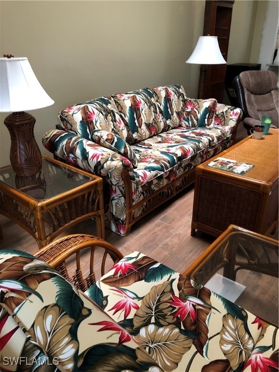 living room with light hardwood / wood-style flooring