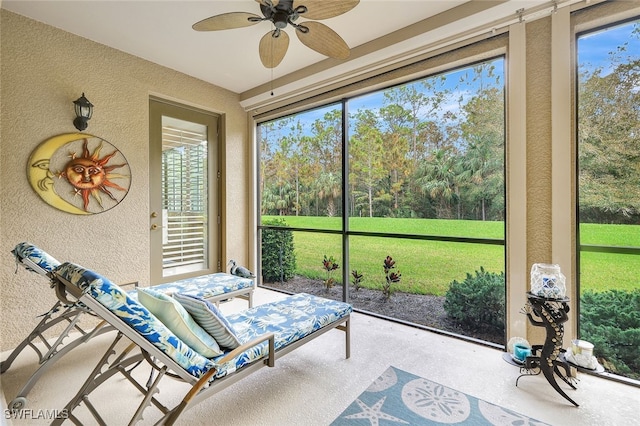 sunroom with ceiling fan and a wealth of natural light