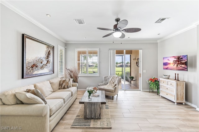 living room featuring crown molding, light hardwood / wood-style flooring, and ceiling fan