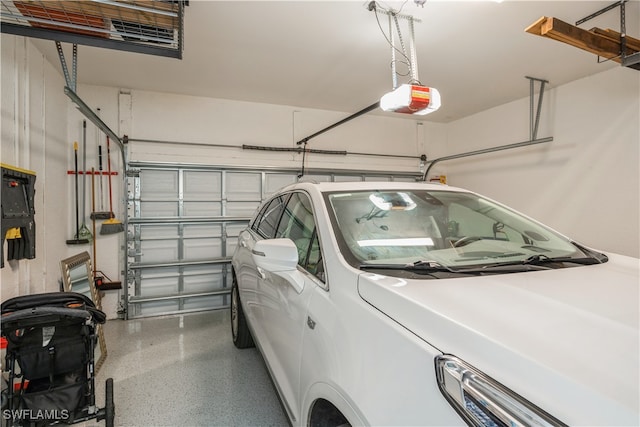 garage featuring a garage door opener