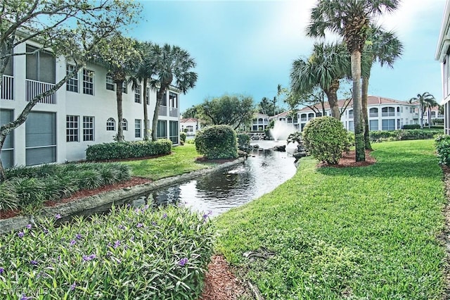 view of community featuring a lawn