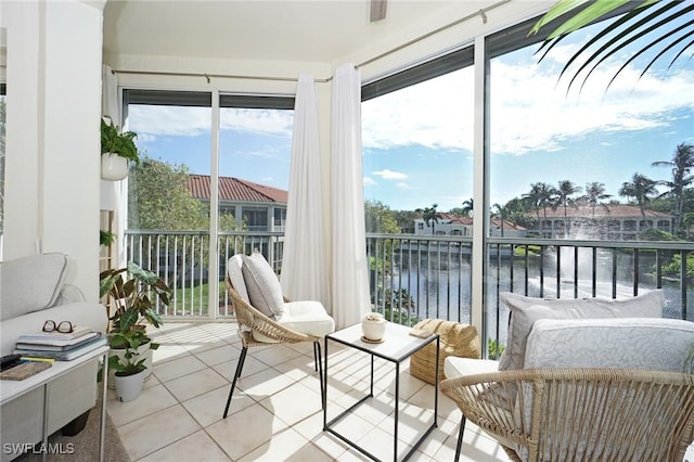 sunroom with a water view