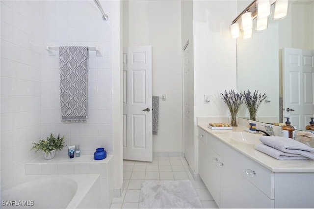 bathroom with tile patterned floors and vanity