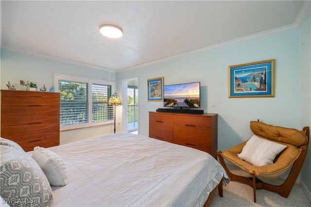 carpeted bedroom featuring crown molding