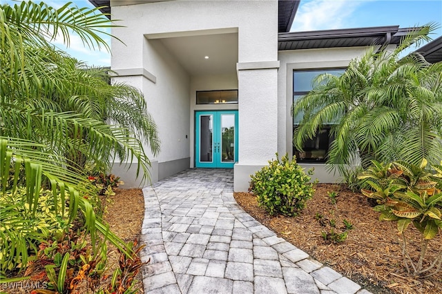 property entrance featuring french doors