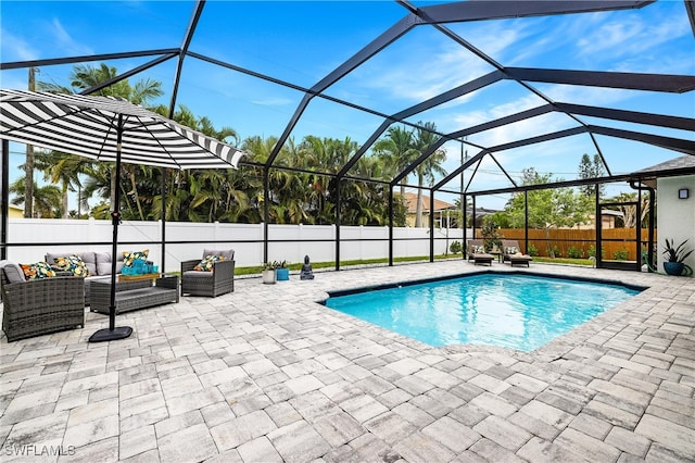 view of swimming pool with a lanai, an outdoor hangout area, and a patio