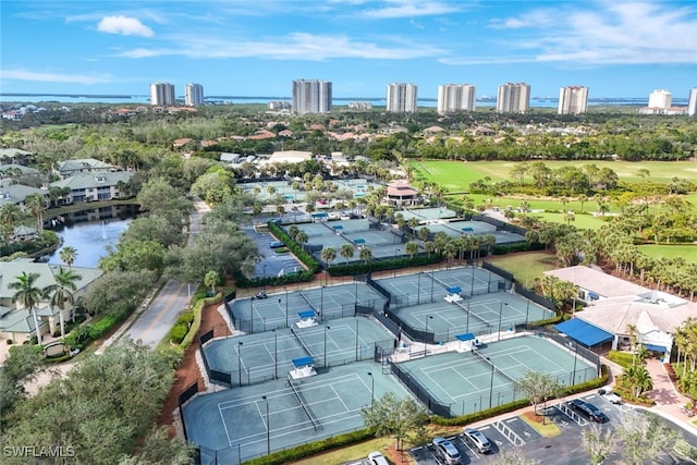 birds eye view of property with a water view