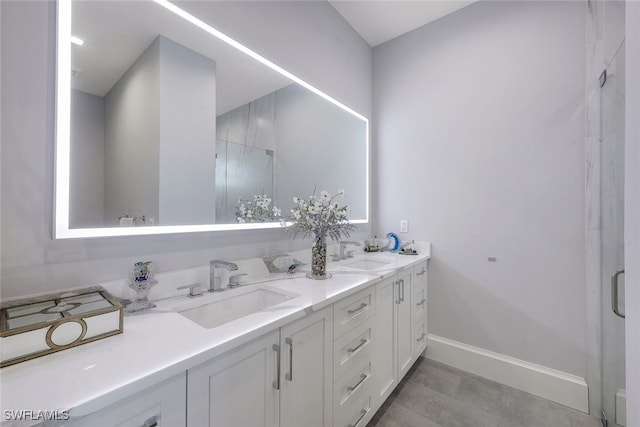 bathroom with vanity and walk in shower