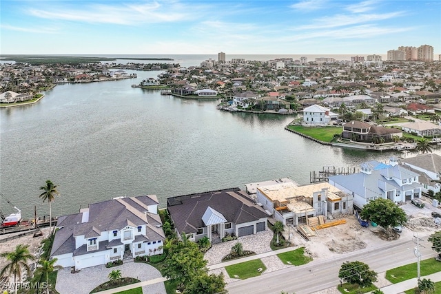 bird's eye view with a water view