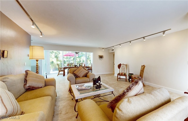 tiled living room with rail lighting