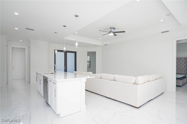 2844 37th Ave NE, Naples, FL 34120 - living area featuring a raised ceiling, recessed lighting, light marble finish floors, ornamental molding, and ceiling fan