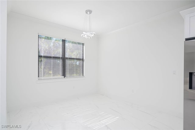 2844 37th Ave NE, Naples, FL 34120 - unfurnished room with marble look tile flooring, crown molding, and a chandelier