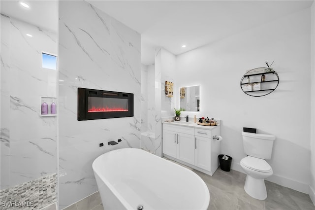 full bathroom featuring vanity, separate shower and tub, toilet, and a high end fireplace