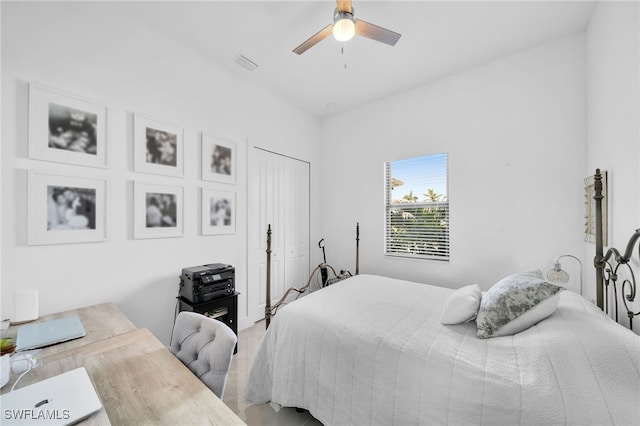 bedroom featuring hardwood / wood-style floors, ceiling fan, and a closet