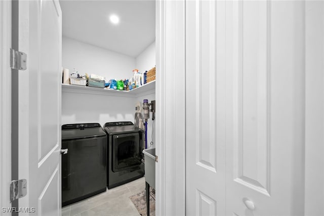 laundry area with washing machine and dryer