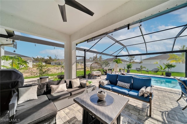 view of patio featuring outdoor lounge area, a lanai, and a fenced in pool