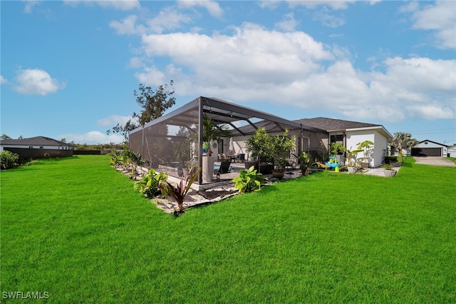 view of yard with glass enclosure