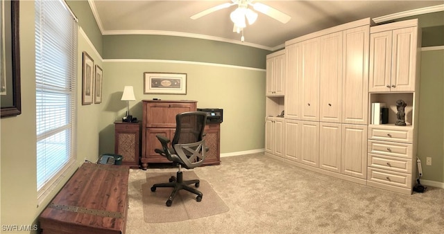 office space with light carpet, ceiling fan, and crown molding