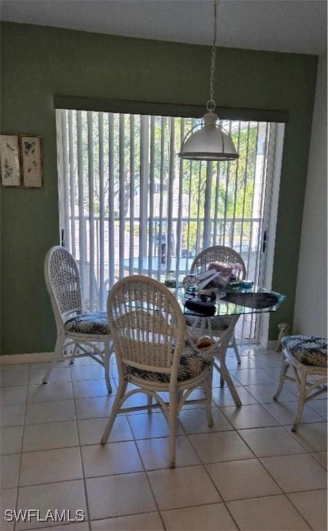 dining room with tile patterned flooring