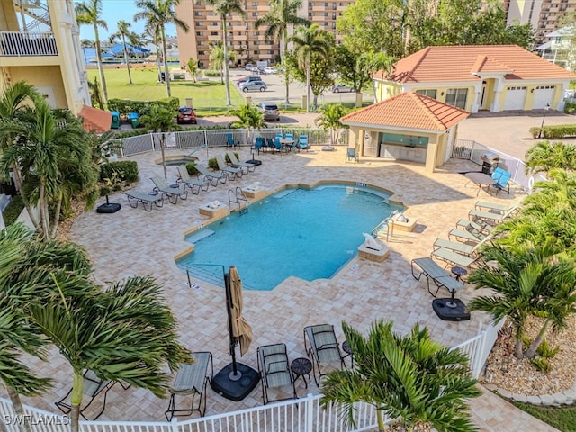 view of swimming pool featuring a patio