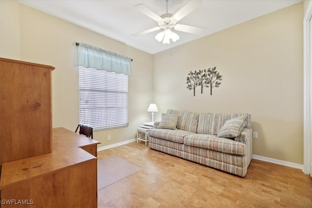 living room with ceiling fan