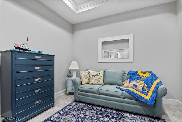 sitting room featuring crown molding